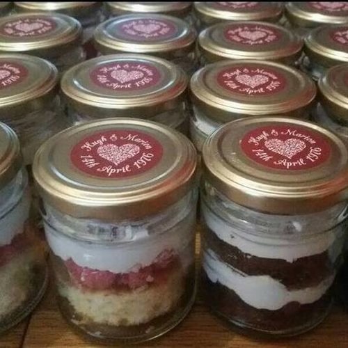 Anniversary mixed jamjar cakes. layered Sponge and chocolate fillings